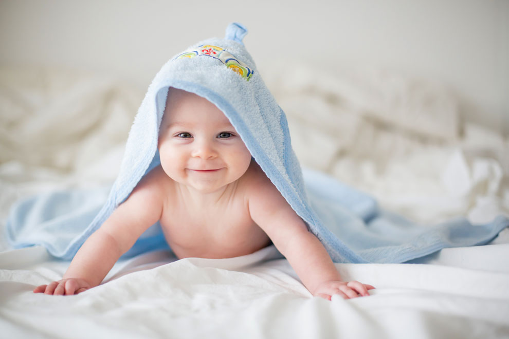 Baby with towel on head