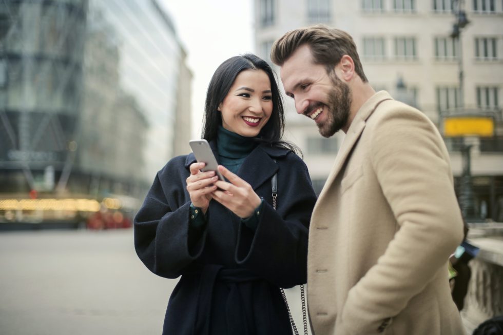 Smiling couple outside