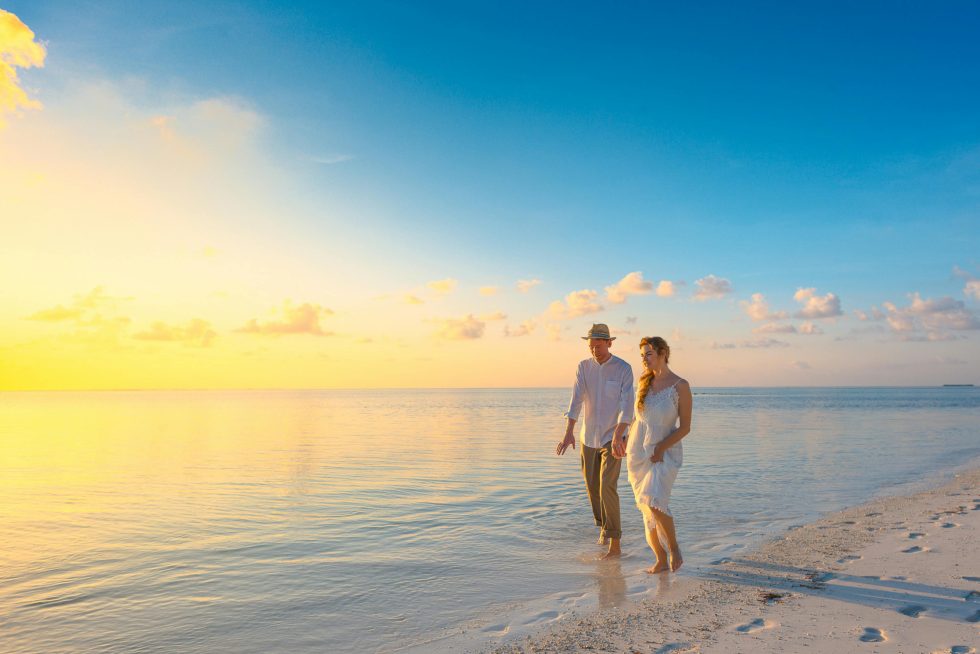 Couple walking beach
