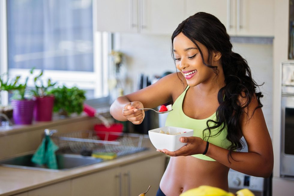 Woman eating fruit