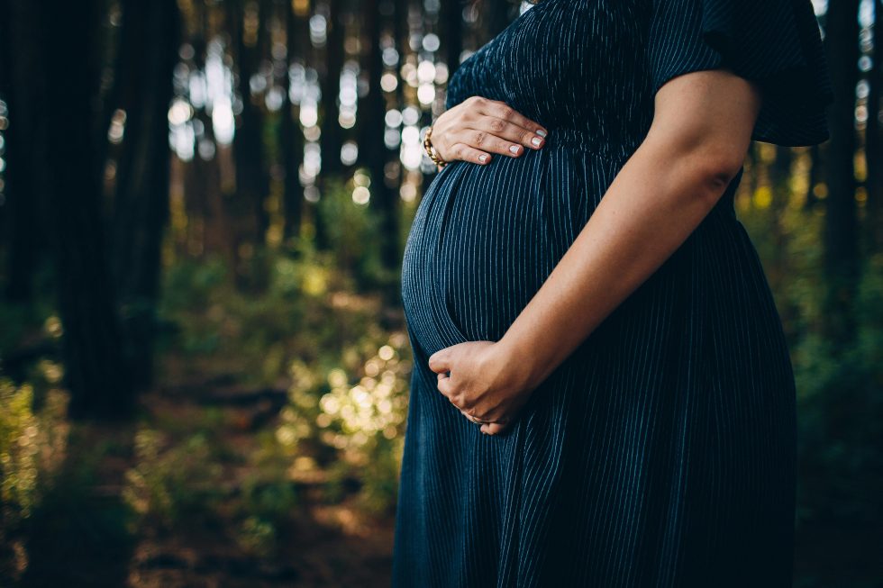 Pregnant woman outdoors